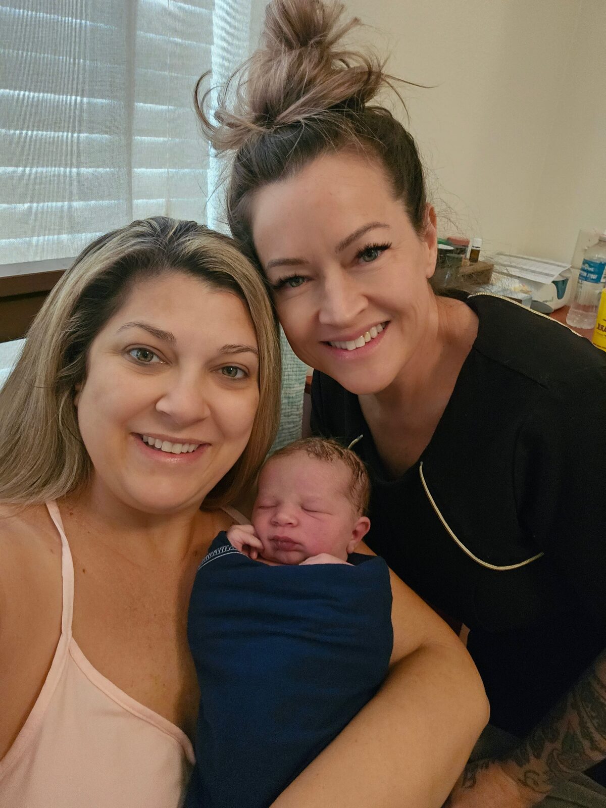 A happy mother with Rhonda and her new baby